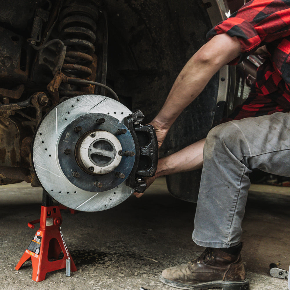 Doc's Diesel Chevrolet/GMC 6.6L Duramax Ceramic Front/Rear Brake Pads + Drilled and Slotted Rear Rotors Kit 2011-2019